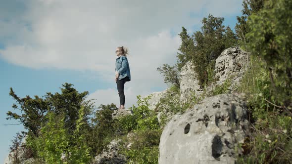 Standing on the Top of the Mountain