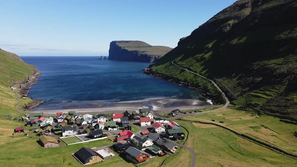 Aerial View of Village in Faroe Islands and Endless Sea Horizon
