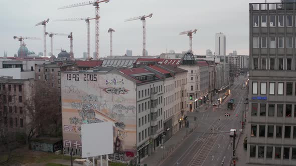 AERIAL: Slow Flight Through Empty Central Berlin Neighbourhood Street with Almost No People and No