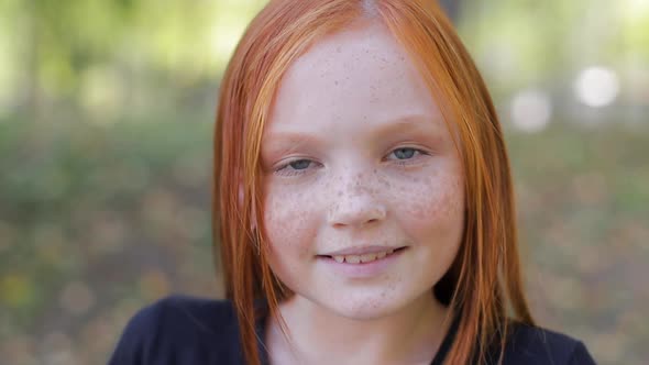 Natural Appearance of a Girl with Beautiful Freckles on Her Face