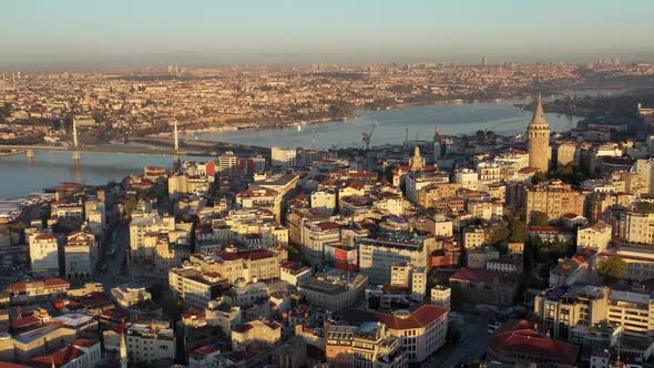 4k footage of bosphorus in the sunset having galata tower in the middle 