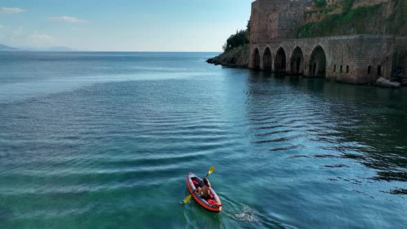 A Guy Sails in a Kayak Aerial View 4 K Alanya Turkey