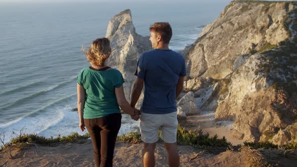 Romantic Couple of Tourists Holding Hands