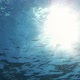 Bright Beams of Sunlight Underwater Refracting through the Surface of Clear Sea - VideoHive Item for Sale