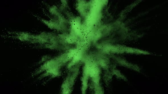 Super Slowmotion Shot of Green Powder Explosion Isolated on Black Background