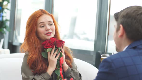 Young Couple on a Date at Restaurant.