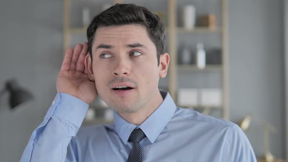 Young Man Listening Secret Carefully