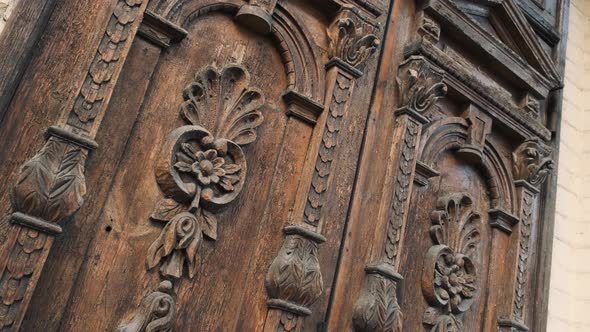 Old Wooden Door of a Beautiful Ancient Building. Wood Texture Doors. Close Up