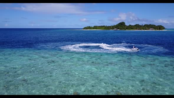 Aerial top view panorama of marine resort beach adventure by blue ocean and white sand background of