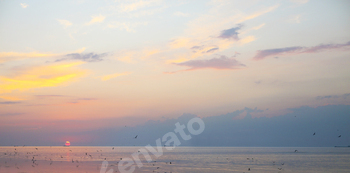 Sunrise over the sea. Panorama