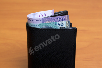 Malaysian ringgit in the black wallet