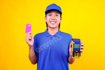 Deliveryman Holds EDC Machine and Credit Card