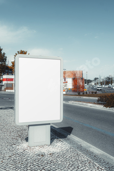 Blank billboard on urban sidewalk