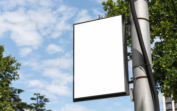 Blank white billboard on the pillar