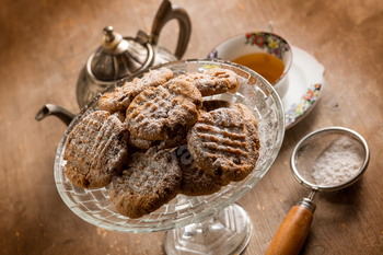 homemade chocolate cookies with cup of tea