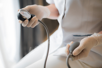 Medical doctor holding a blood pressure meter medical equipment