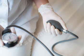 Medical doctor holding a blood pressure meter medical equipment