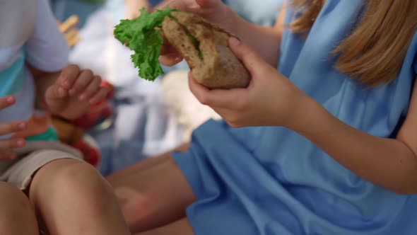 Unrecognized Girl Hands Holding Sandwich Closeup