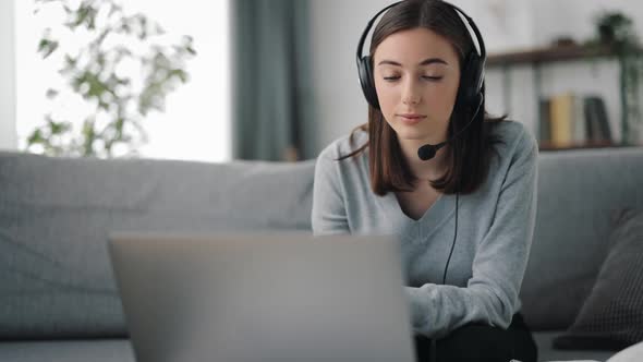 Operator Using Headset and Laptop