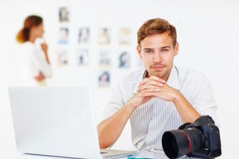 Handsome young photographer