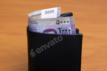 Syrian Pound in the black wallet