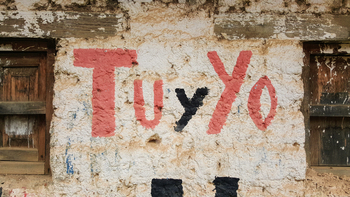 A wall with the word TuYo written on it