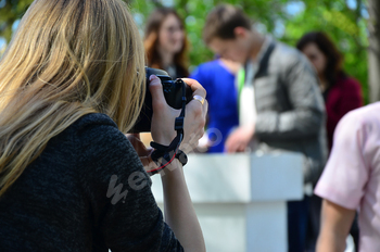 Wedding photographer in the process of his work. Professional photographer