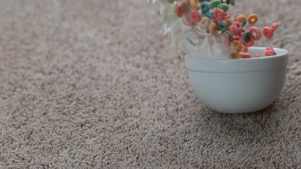 Bowl of cereal spilling on carpet in slow motion; shot on Phantom Flex 4K at 1000 fps