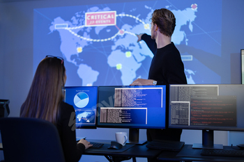 Cyber security team working in a Cyber Security Operations Center SOC to protect datacenter from