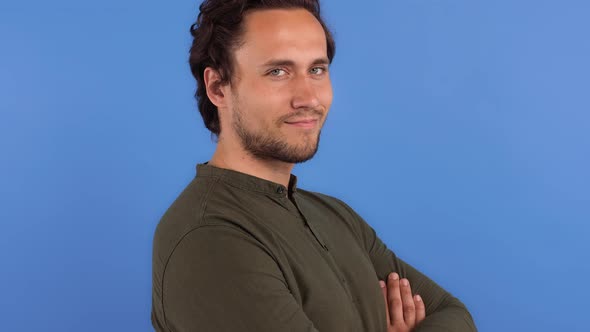 Bearded Man in Khaki Colored Shirt