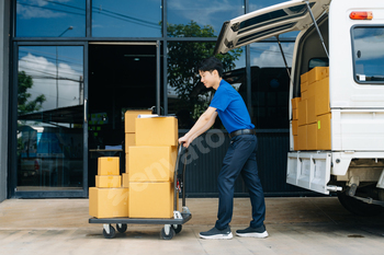 Portrait of courier delivery man searching the address on digital tablet. Delivery service,