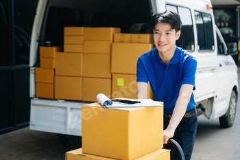 Portrait of courier delivery man searching the address on digital tablet. Delivery service,