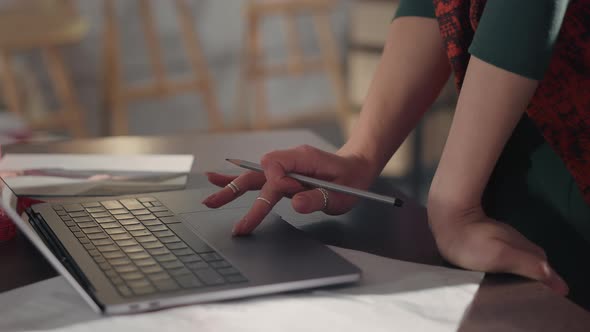 Hands Of Woman Working On Laptop