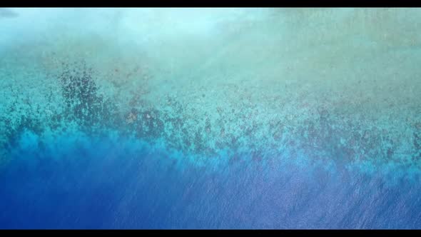 Aerial texture of exotic resort beach vacation by blue sea with white sand background of a picnic ne