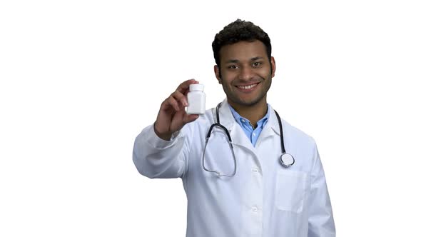 Doctor Showing Pills and Thumb Up to Camera