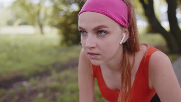 Athletic Fitness Sport Motivated Runner Girl Training Preparing to Run Race Marathon Start in Park