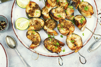 Mackerel fish on skewers.