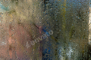 drops of water on the glass. wet glass background