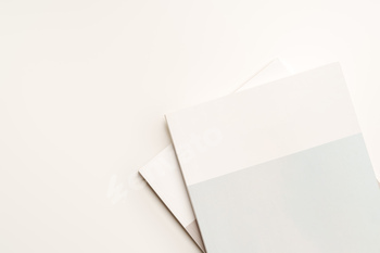 Stack of blank paper on beige background