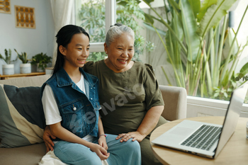 Grandma And Granddaughter Having Video Call