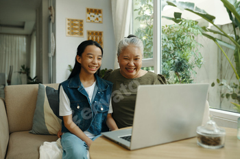 Family Having Video Call On Laptop