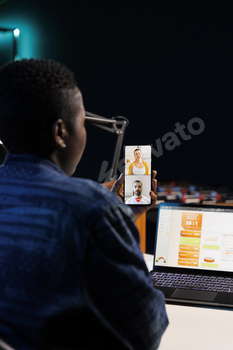 Woman on video call and using laptop