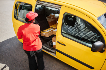 Loading Packages into Yellow Delivery Van