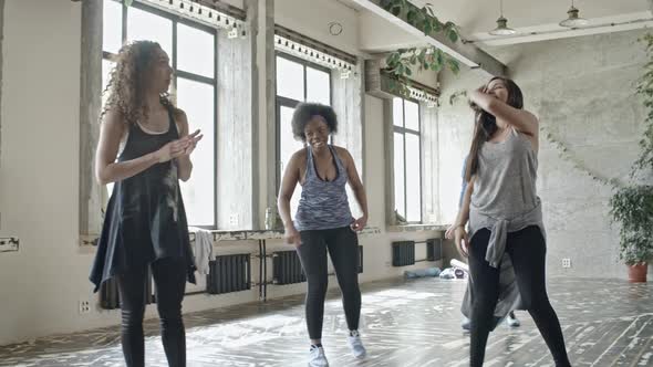 Young Women Practicing Dance Moves