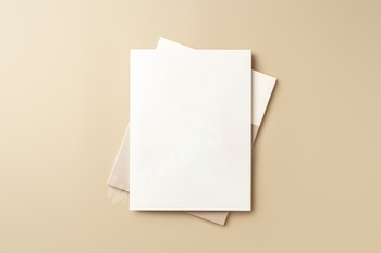 Stack of blank paper on beige background