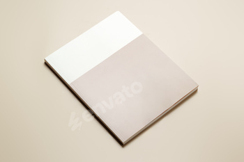 Stack of blank paper on beige background