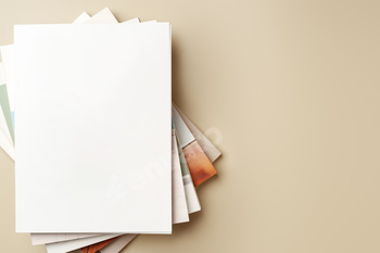 Stack of blank paper on beige background