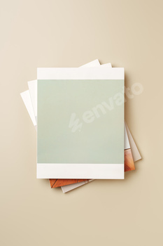 Stack of blank paper on beige background