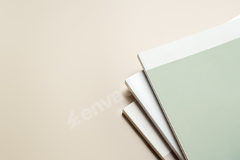 Stack of blank paper on beige background