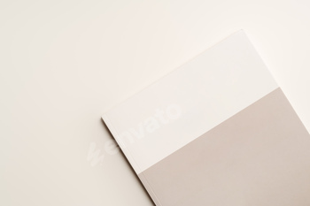 Stack of blank paper on beige background